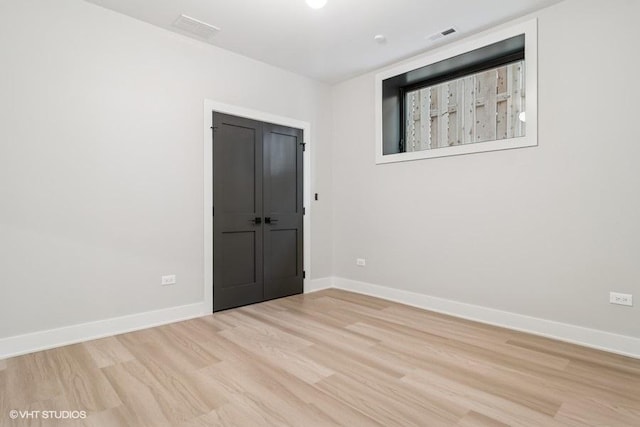 1928 W George St, Chicago, IL 60657 - unfurnished room featuring light wood-style floors and baseboards