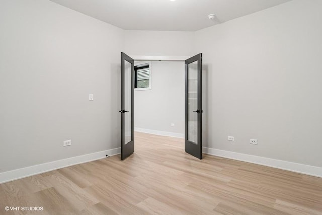 1928 W George St, Chicago, IL 60657 - unfurnished room with light wood-style flooring and baseboards