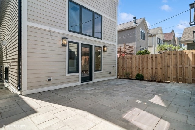 1928 W George St, Chicago, IL 60657 - rear view of property with a patio