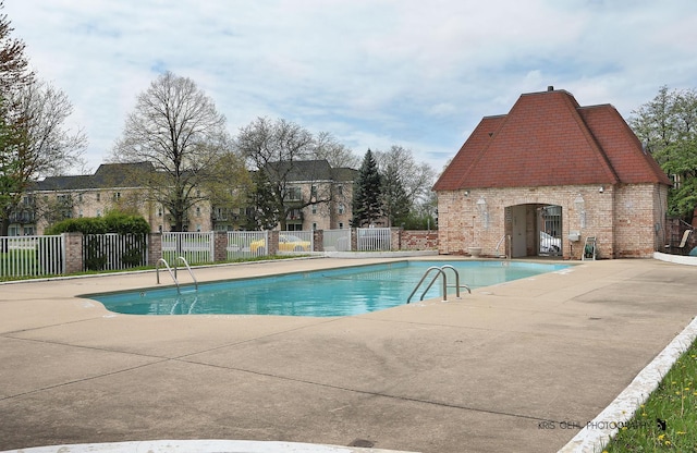 5201 Carriageway Dr Unit 311, Rolling Meadows, IL 60008 - pool with fence and a patio area