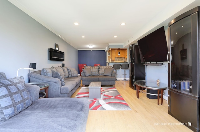 5201 Carriageway Dr Unit 311, Rolling Meadows, IL 60008 - living area featuring light wood-style floors, ornamental molding, and recessed lighting