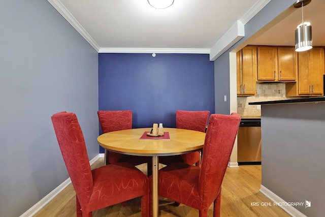 5201 Carriageway Dr Unit 311, Rolling Meadows, IL 60008 - dining room with light wood-style floors, ornamental molding, and baseboards