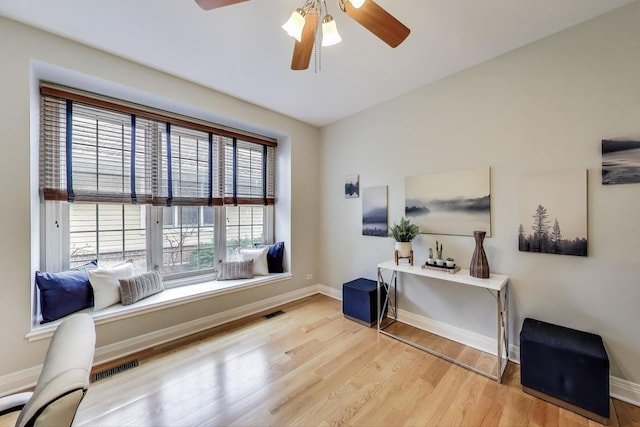 office with wood finished floors, baseboards, and ceiling fan
