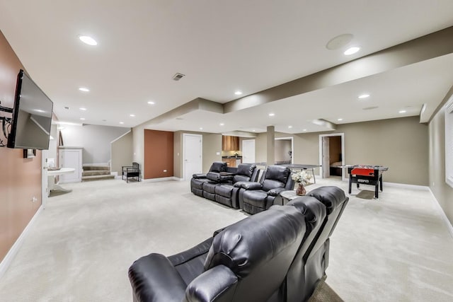 living area featuring light carpet, baseboards, stairs, and recessed lighting