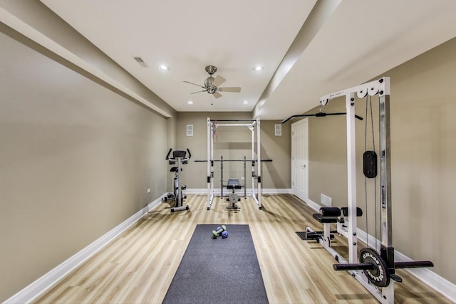workout room with light wood-style floors, ceiling fan, baseboards, and recessed lighting