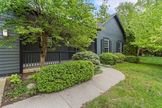 view of home's exterior featuring a yard