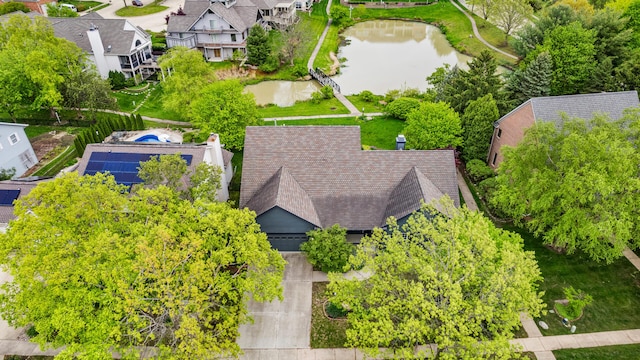aerial view of residential area with a nearby body of water