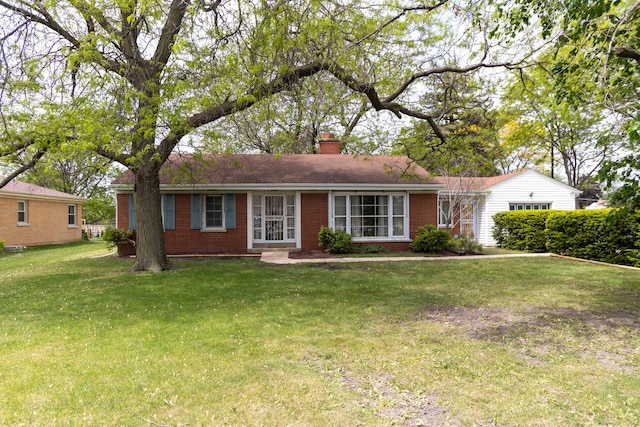 9450 Greenwood Ave, Des Plaines, IL 60016 - single story home with brick siding, a chimney, and a front yard