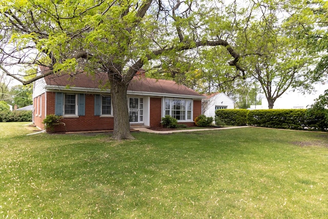 9450 Greenwood Ave, Des Plaines, IL 60016 - ranch-style house featuring brick siding and a front yard