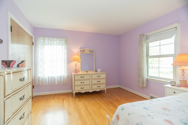 9450 Greenwood Ave, Des Plaines, IL 60016 - bedroom with light wood-type flooring and baseboards