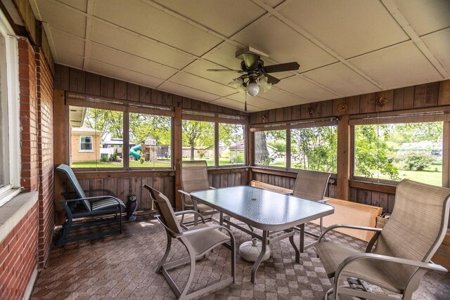 9450 Greenwood Ave, Des Plaines, IL 60016 - sunroom with ceiling fan, outdoor dining area, and lofted ceiling