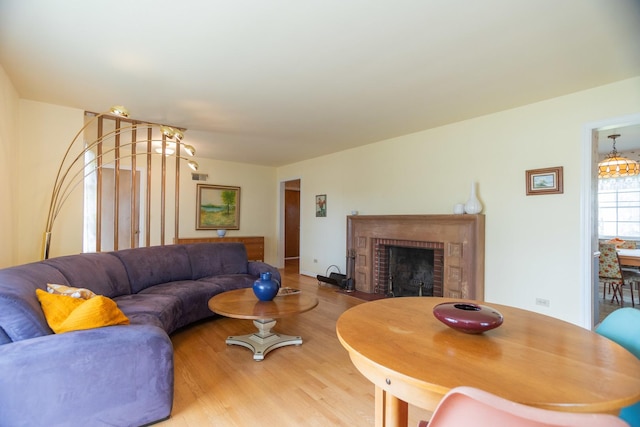 9450 Greenwood Ave, Des Plaines, IL 60016 - living area featuring a fireplace and wood finished floors