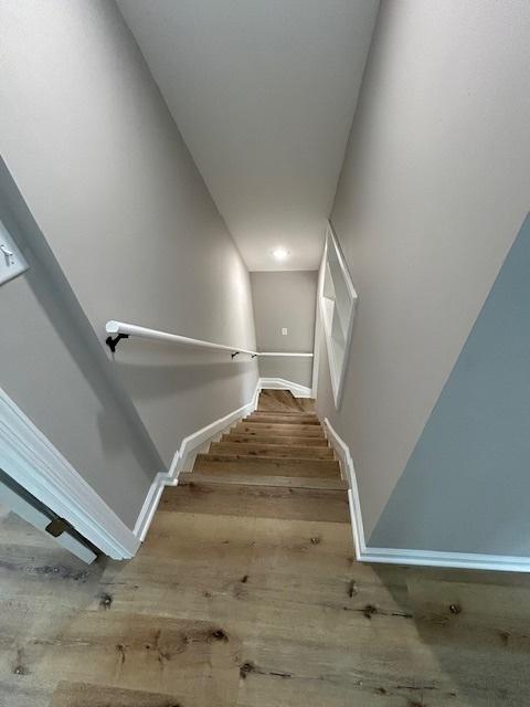 1473 Wentworth Ave, Calumet City, IL 60409 - stairway featuring wood finished floors and baseboards
