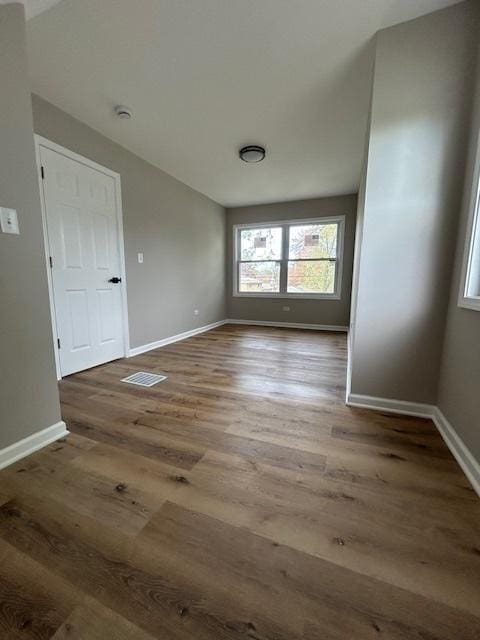 1473 Wentworth Ave, Calumet City, IL 60409 - spare room with wood finished floors and baseboards