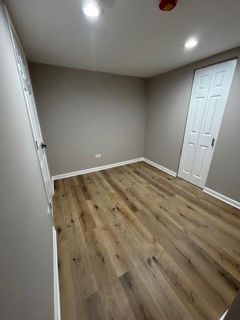 1473 Wentworth Ave, Calumet City, IL 60409 - unfurnished bedroom featuring wood finished floors and recessed lighting