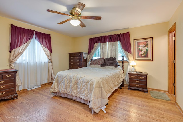 400 Illinois Rd, Frankfort, IL 60423 - bedroom featuring light wood-style flooring, baseboards, and a ceiling fan