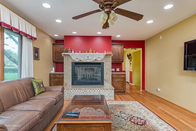 400 Illinois Rd, Frankfort, IL 60423 - living room with light wood-style flooring, ceiling fan, recessed lighting, a fireplace, and baseboards