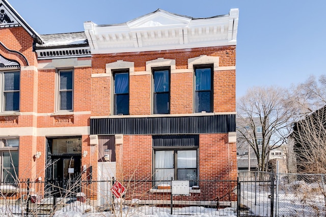 1449 N Artesian Ave, Chicago, IL 60622 - view of front of home with brick siding and fence