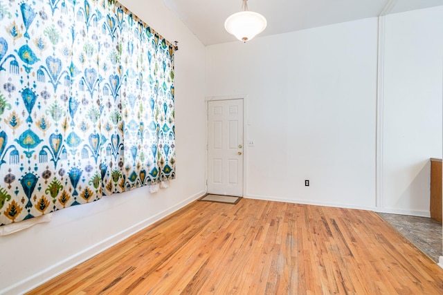 1449 N Artesian Ave, Chicago, IL 60622 - spare room with wood-type flooring and baseboards
