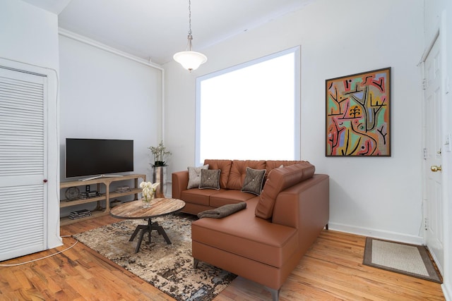 1449 N Artesian Ave, Chicago, IL 60622 - living room with baseboards, ornamental molding, and wood finished floors