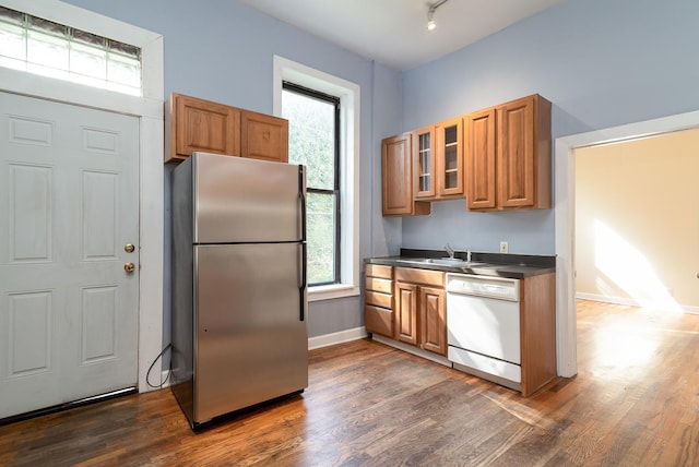 1449 N Artesian Ave, Chicago, IL 60622 - kitchen featuring freestanding refrigerator, dark wood-style flooring, dark countertops, and dishwasher