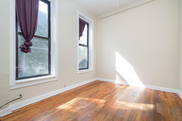 1449 N Artesian Ave, Chicago, IL 60622 - empty room featuring baseboards and wood finished floors