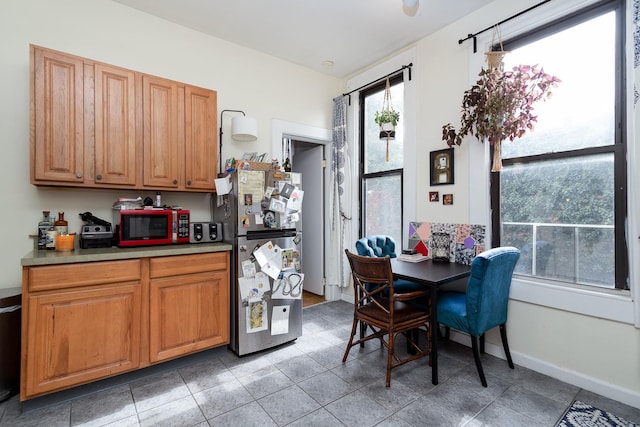 1449 N Artesian Ave, Chicago, IL 60622 - dining room with baseboards and light tile patterned flooring