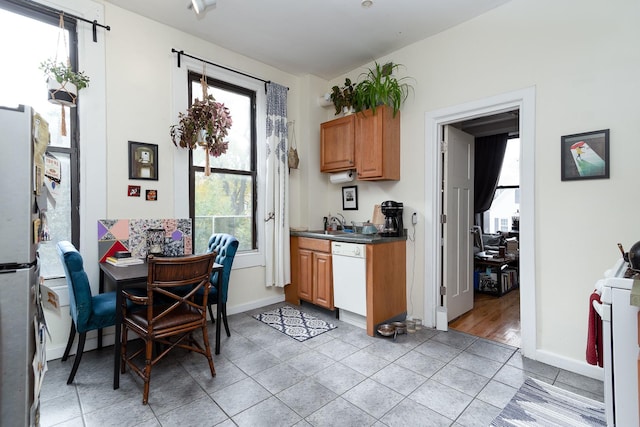 1449 N Artesian Ave, Chicago, IL 60622 - kitchen featuring a sink, a wealth of natural light, and white appliances