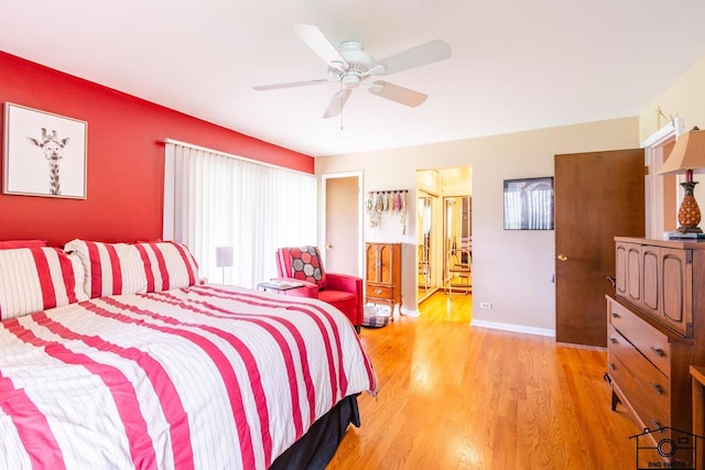 2312 Robertson Ln, Flossmoor, IL 60422 - bedroom featuring multiple windows, light wood-type flooring, ceiling fan, and baseboards