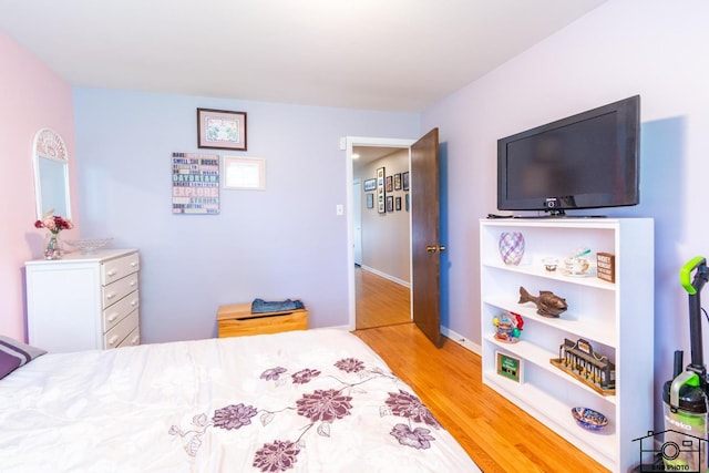 2312 Robertson Ln, Flossmoor, IL 60422 - bedroom with light wood-style floors and baseboards
