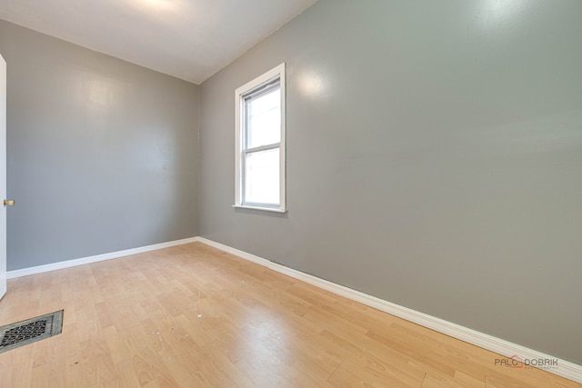 3117 S 53rd Ave, Cicero, IL 60804 - empty room featuring baseboards and light wood finished floors