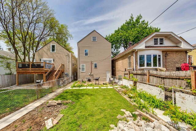 3117 S 53rd Ave, Cicero, IL 60804 - rear view of house with a deck, stairs, and brick siding