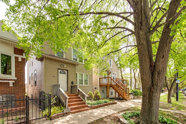 3117 S 53rd Ave, Cicero, IL 60804 - view of front of home featuring fence, a gate, and stairs