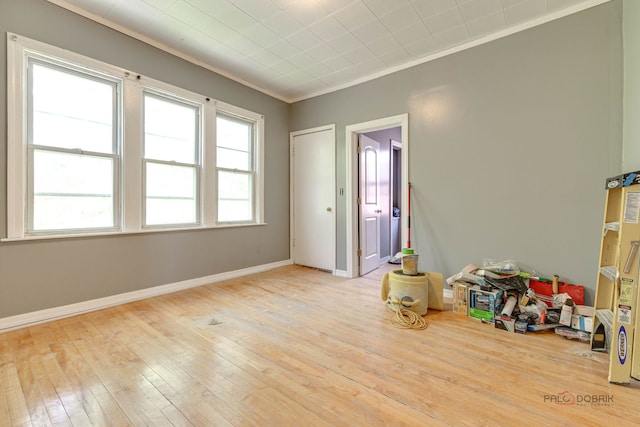 3117 S 53rd Ave, Cicero, IL 60804 - unfurnished bedroom featuring wood-type flooring, ornamental molding, and baseboards