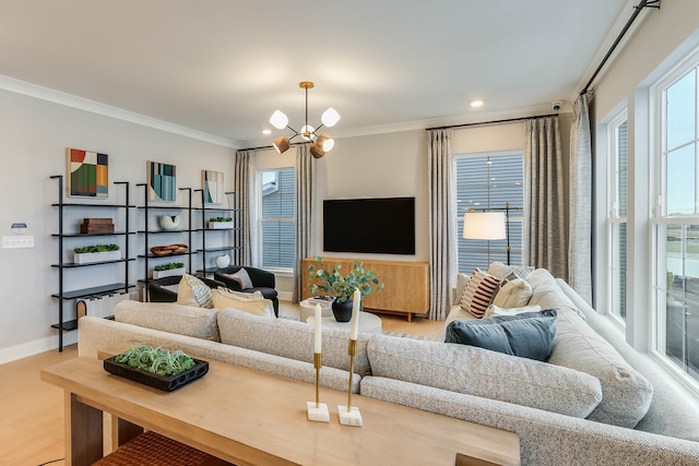 living area with wood finished floors, baseboards, an inviting chandelier, ornamental molding, and recessed lighting