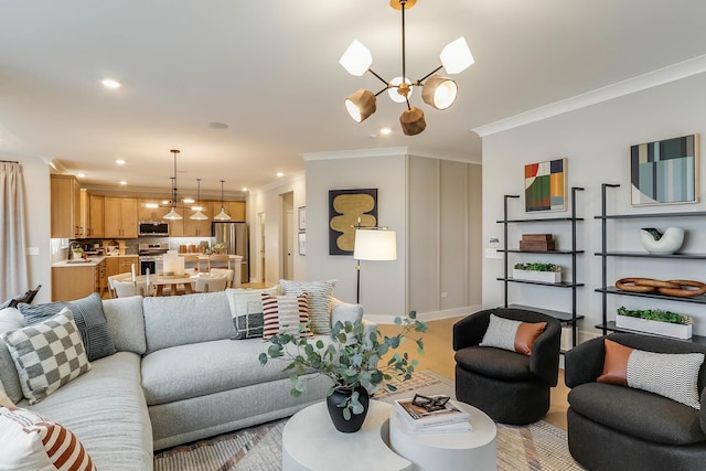 living area featuring crown molding, baseboards, recessed lighting, and a chandelier