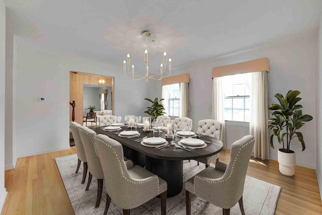 26W266 Tomahawk Dr, Wheaton, IL 60189 - dining space with a chandelier and light wood-type flooring