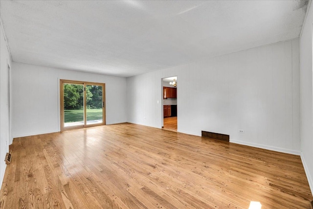 26W266 Tomahawk Dr, Wheaton, IL 60189 - empty room with light wood-style flooring