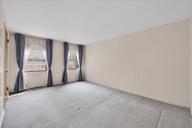 26W266 Tomahawk Dr, Wheaton, IL 60189 - spare room featuring carpet floors and baseboards