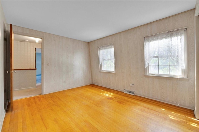 26W266 Tomahawk Dr, Wheaton, IL 60189 - spare room with wood finished floors and baseboards