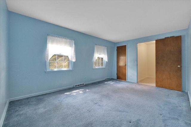 26W266 Tomahawk Dr, Wheaton, IL 60189 - unfurnished bedroom featuring baseboards and carpet floors
