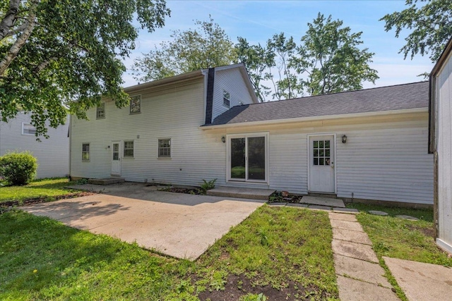 26W266 Tomahawk Dr, Wheaton, IL 60189 - back of property featuring a lawn, a patio, and entry steps