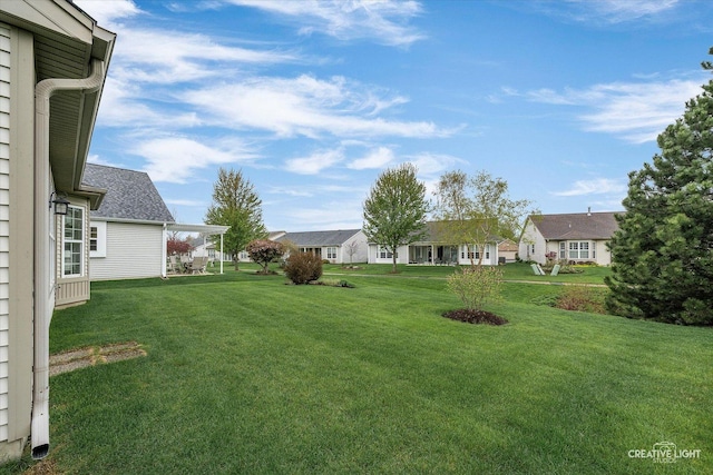 view of yard featuring a residential view