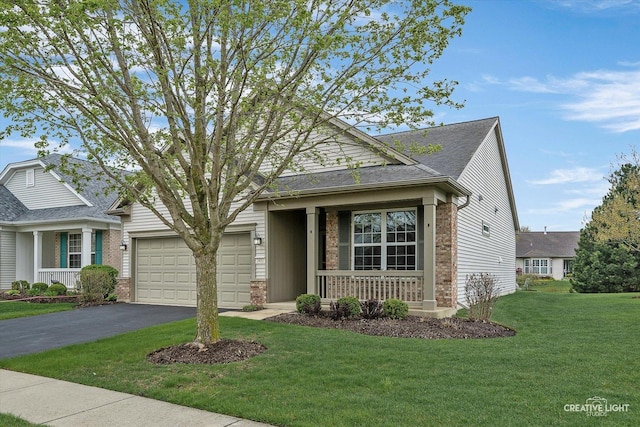 view of front facade featuring a garage, covered porch, brick siding, and aphalt driveway