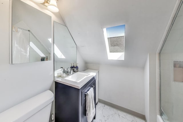 bathroom featuring toilet, lofted ceiling with skylight, a shower with door, marble finish floor, and vanity