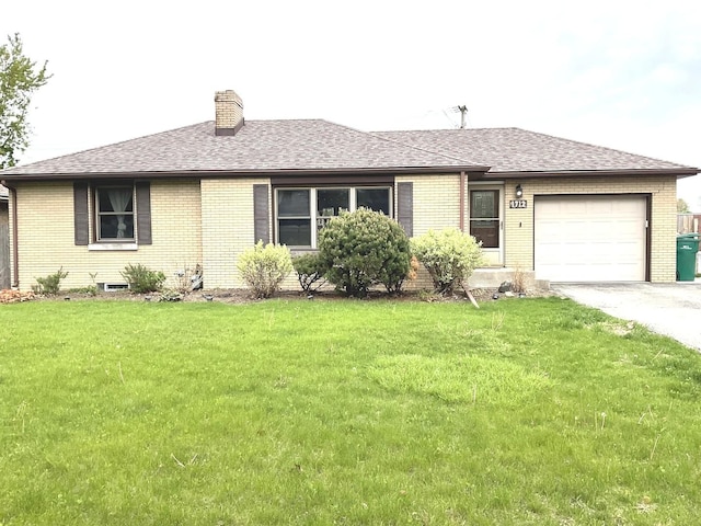single story home featuring concrete driveway, brick siding, a front lawn, and a garage
