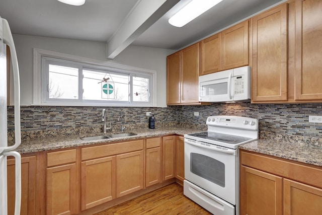 66W Jeffery Ave, Wheeling, IL 60090 - kitchen featuring decorative backsplash, beam ceiling, white appliances, a sink, and light wood finished floors
