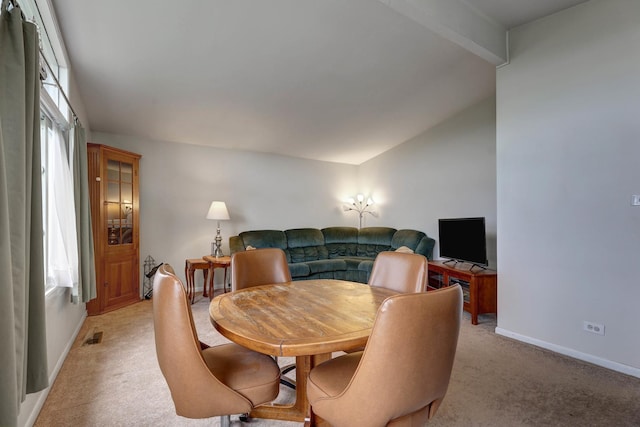66W Jeffery Ave, Wheeling, IL 60090 - dining area with baseboards, visible vents, light carpet, and lofted ceiling