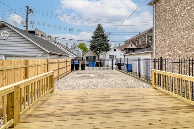 deck with a fenced backyard
