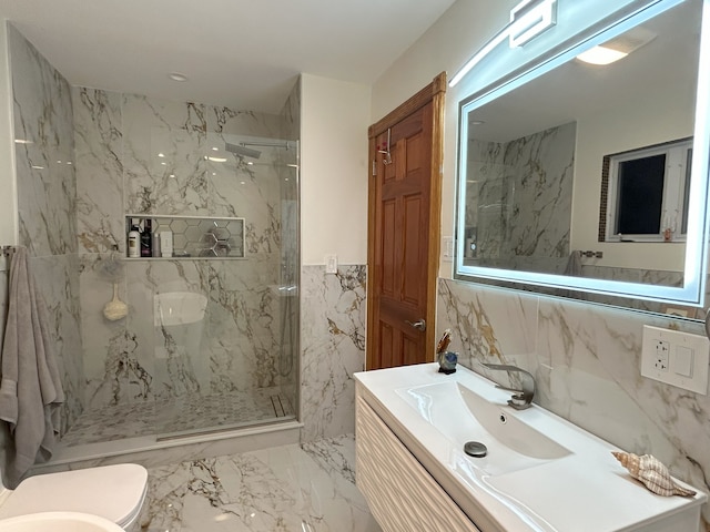 full bathroom with tile walls, a marble finish shower, toilet, vanity, and marble tiled floors
